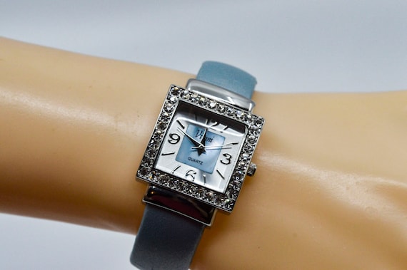 Silver tone with blue bracelet womens cuff watch - image 1