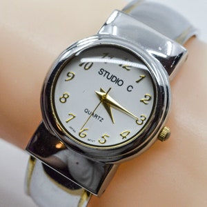 Silver tone with white dial womens cuff watch