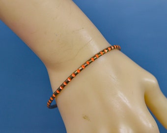 Gold and orange tone, womens bangle bracelet