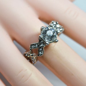 Silver tone with crystals womens ring,size 9