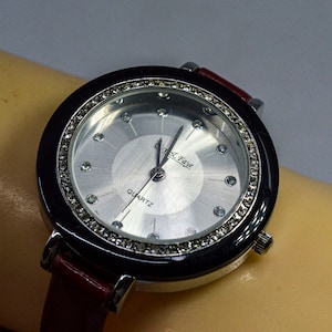 Silver and black tone with red bracelet womens fashion watch
