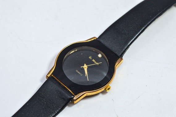 Black and gold tone womens wrist watch - image 3