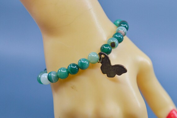 Green tone,womens,beaded,stretch bracelet - image 1
