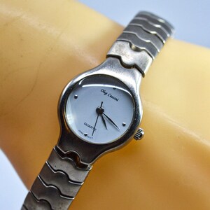Silver tone with white dial, womens fashion watch