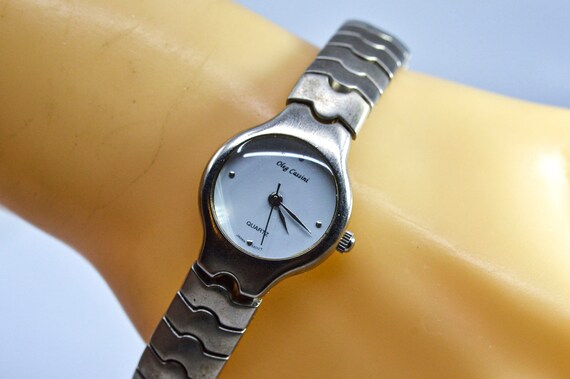 Silver tone with white dial, womens fashion watch - image 1