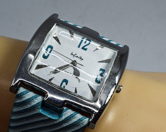 Silver and blue tone womens , large wrist watch
