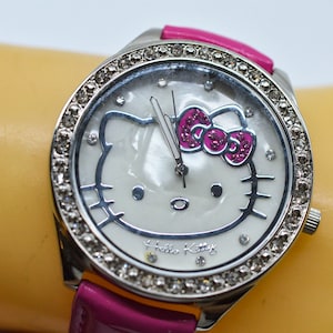 Silver and pink tone with crystals womens fashion watch