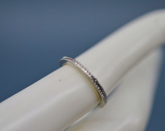 Silver tone, womens band ring,size 7