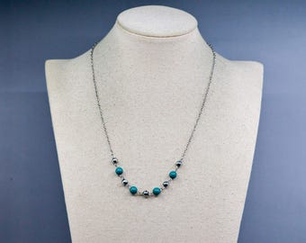 Groene en zilverkleurige dameskralenketting