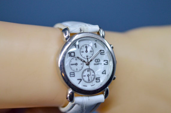 Silver tone with white bracelet, womens watch - image 1