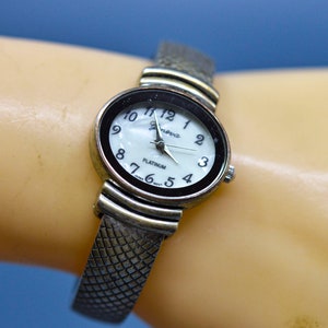 Silver tone , womens cuff watch