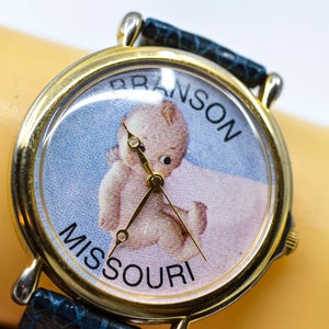 Large , gold tone womens fashion watch