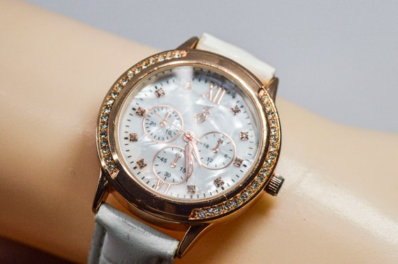 Rose gold with mop dial and crystals womens wrist… - image 1