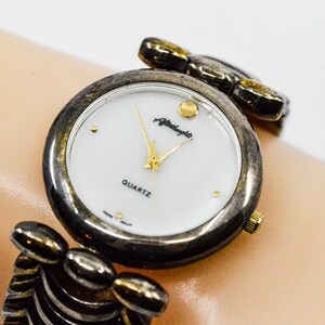 Silver tone with mop dial womens fashion watch