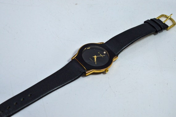 Black and gold tone womens wrist watch - image 2
