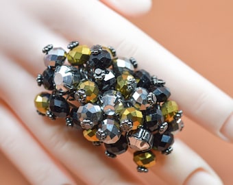Black  and gold tone, womens, streth ring,size 9