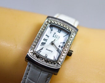 Silver tone with crystals, white bracelet, womens fashion watch