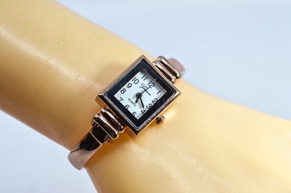 Gold cuff watch hot sale
