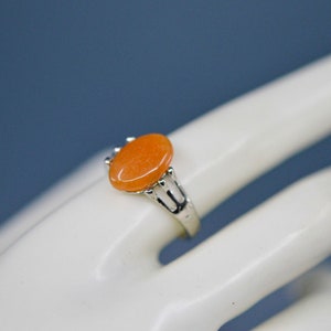Silver tone with orange ornament, women&#39;s ring, size 9 1/2
