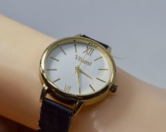 Gold tone with black band womens fashion wrist watch