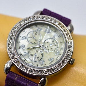 Silver ton ewith crystals, purple bracelet, womens watch