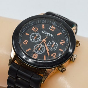 Rose gold and black tone womens fashion watch