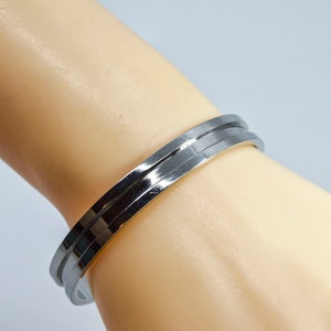 Silver tone womens cuff bracelet