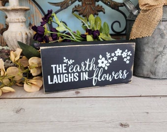 The earth laughs in flowers phrase sign, funny signs, funny phrases, tier blocks, stacked books, stacked wood books, Rustic Charm Signs
