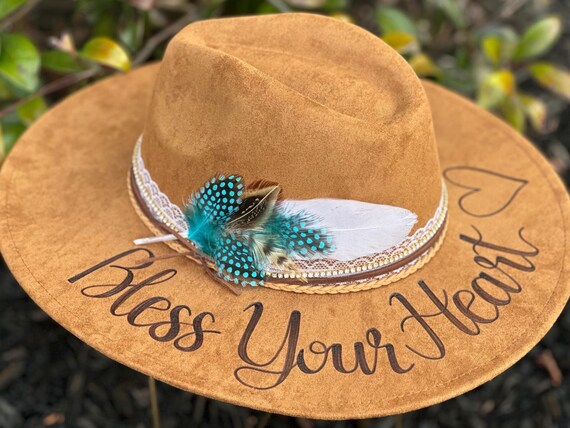 Megan Moroney Concert Hat with Bless Your Heart wording and feather accents.  Custom cowgirl hat hand burned, Southern Sayings