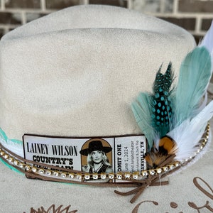 Custom hand burned wide brimmed cowgirl hat