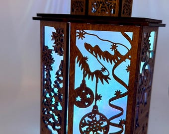 Christmas lantern with battery operated led puck light.