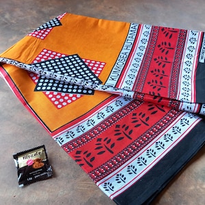 African kanga, Tanzania khanga nzito, kanga, leso, kanga Tanzania, kanga morogoro, kanga orange red, &quot;Mungu akiwa moyoni kumkosea hutamani&quot;