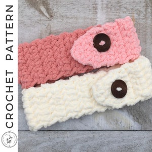 May include: Two crocheted headbands with button closures. One headband is pink and the other is cream.