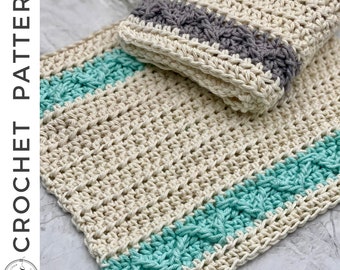 May include: Two crocheted dishcloths, one with a teal and white stripe and the other with a gray and white stripe. Both dishcloths are made with a textured stitch.