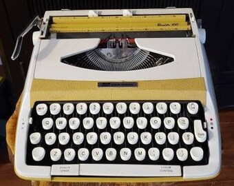 Smith Corona Profile 100 Portable Manual Typewriter in Case, Made in England,  Yellow Typewriter