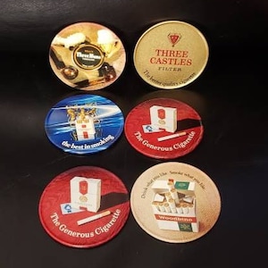 Vintage Tobacco and Cigarettes Advertising Coasters, 6 Tobacciana metal with Cork back round Drink coasters,  boxed set
