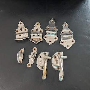 May include: A white ceramic mug with a black handle and the text "But First, Coffee" in a bold, black font. The mug is set against a blurred background, highlighting its clean design.