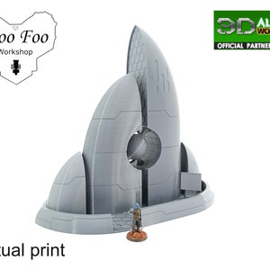 May include: A 3D printed model of a futuristic building with a large, circular opening in the centre. The building is made of grey plastic and has a smooth, rounded design. The model is approximately 25 cm tall and 12.5 cm wide.