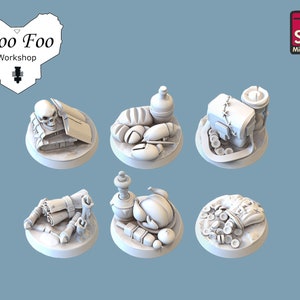 May include: Six 3D printed miniature bases with various objects on top, including a skull, a book, a bottle, bread, a chicken, a chest, coins, and scrolls. The bases are white and the objects are gray.