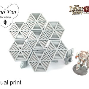 May include: A set of nine 3D printed hexagonal tiles with a geometric design. The tiles are gray and have a textured surface. The tiles are arranged in a honeycomb pattern. The tiles are printed by The Dragon's Rest.