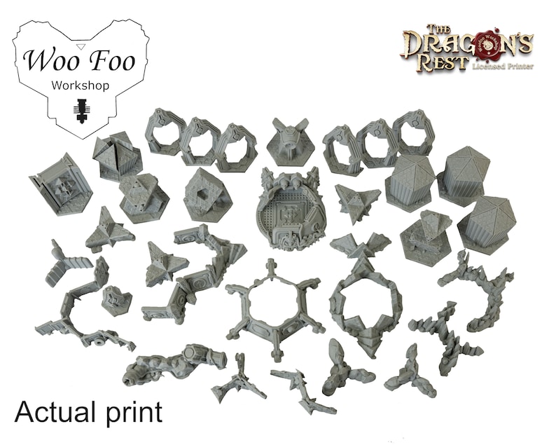 May include: A collection of gray, 3D-printed miniature architectural elements and structures. The image includes various shapes, including geometric forms, arches, and decorative pieces. The text "Actual print" is visible at the bottom of the image.