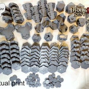 May include: A collection of gray 3D printed terrain pieces for tabletop gaming. The set includes various shapes and sizes of walls, towers, and other structures. The pieces are arranged on a white surface. The text "The Dragon's Rest" is visible in the upper right corner of the image. The text "Woo Foo Workshop" is visible in the upper left corner of the image.