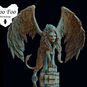 May include: A detailed, 3D printed miniature of a winged lion with a fierce expression. The lion is standing on a stone base and has intricately sculpted wings and fur.
