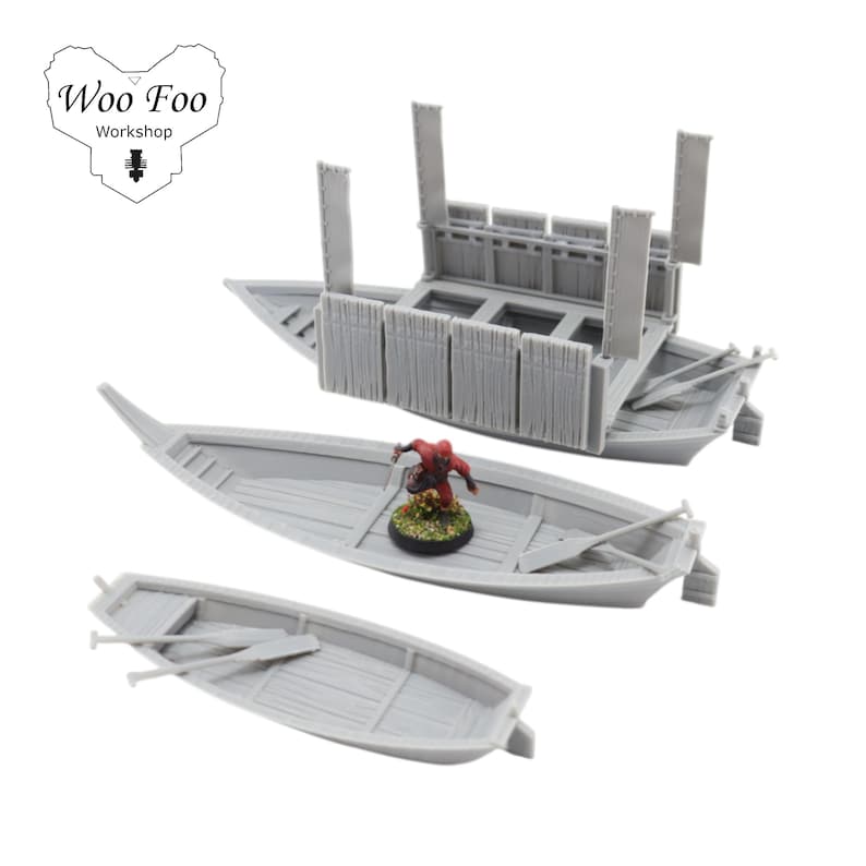 May include: Three grey miniature boats, one with a detailed wooden structure and vertical posts. A small figurine stands in one boat. The boats are arranged on a white background. The logo "Woo Foo Workshop" is in the upper left corner.