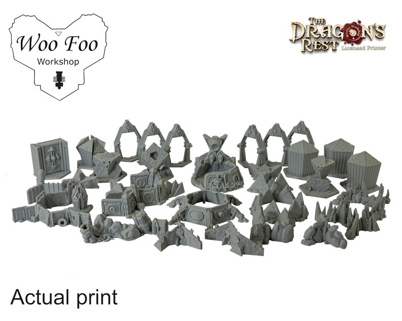 May include: A collection of gray 3D-printed terrain pieces for tabletop gaming. Includes arches, walls, and other structures. The text "Woo Foo Workshop" and "The Dragon's Rest" are visible. The words "Actual print" are also visible.