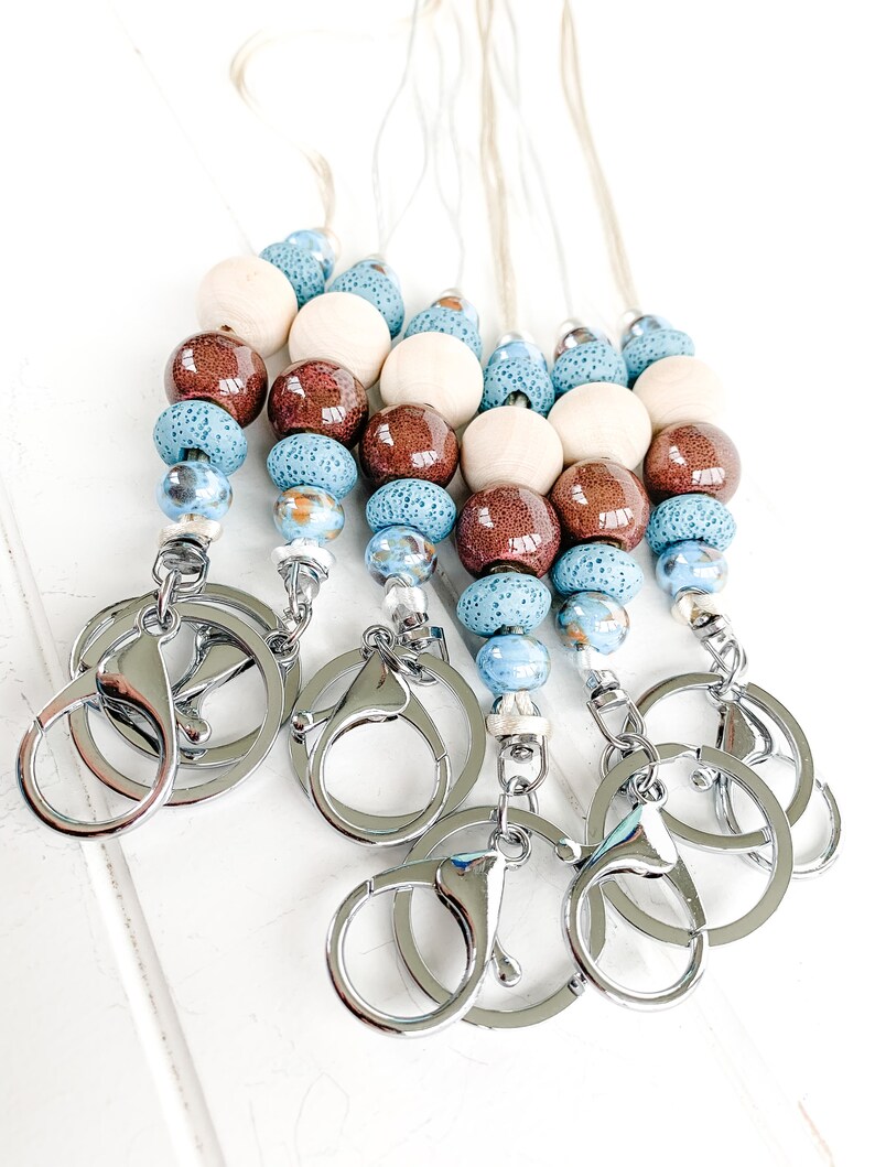 Beaded Lava Stone Diffuser Lanyard with blue marble ceramic beads