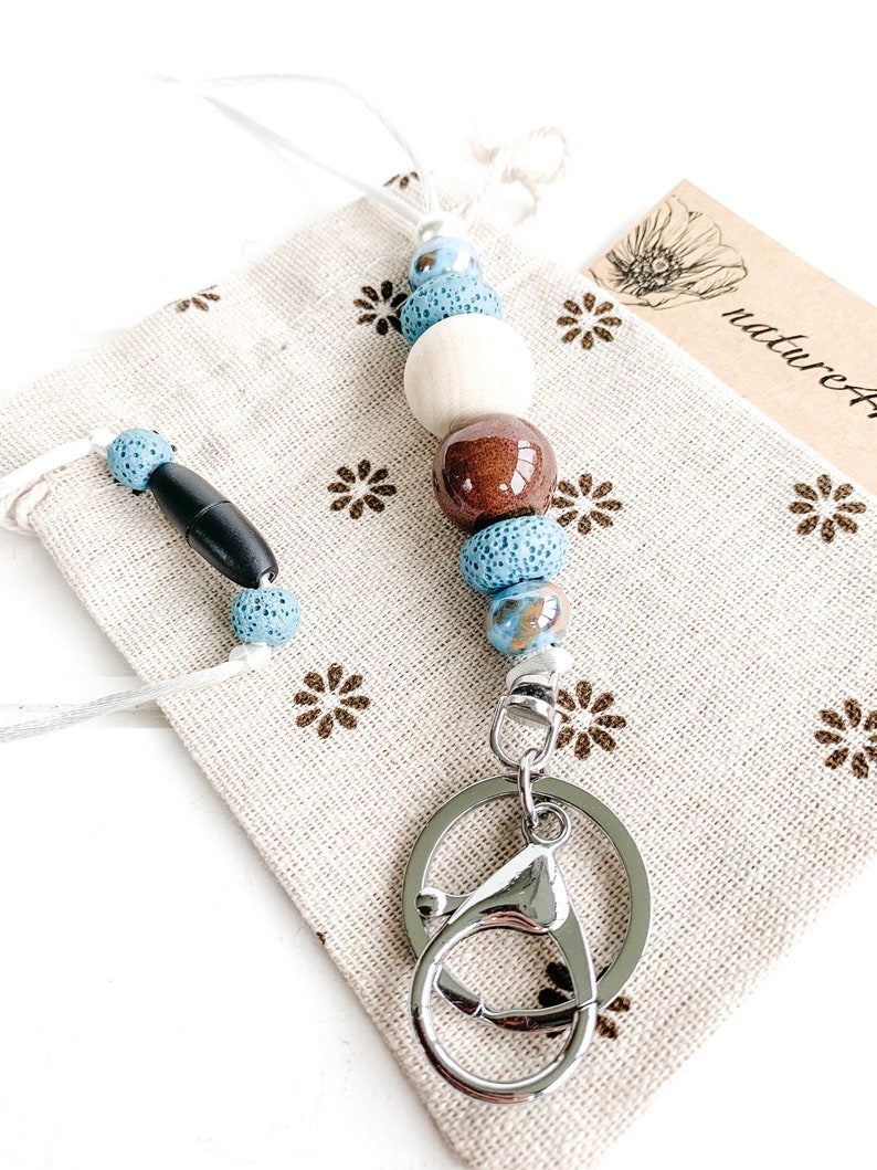 Beaded Lava Stone Diffuser Lanyard with blue marble ceramic beads