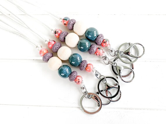 Beaded Lava Stone Diffuser Lanyard with blue marble ceramic beads