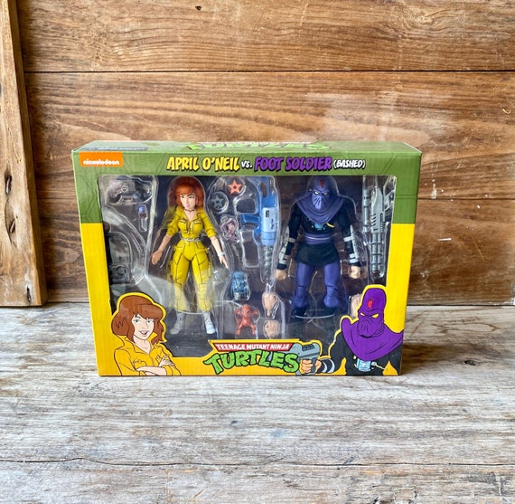 NECA Teenage Mutant Ninja Turtles April O'neil & Bashed Foot