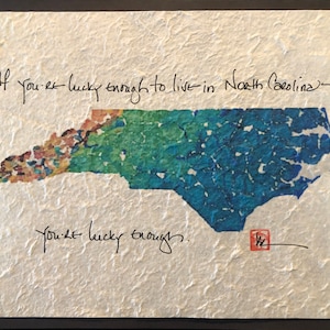 If you're lucky enough to live in North Carolina, you're lucky enough. handpainted handmade paper poster.